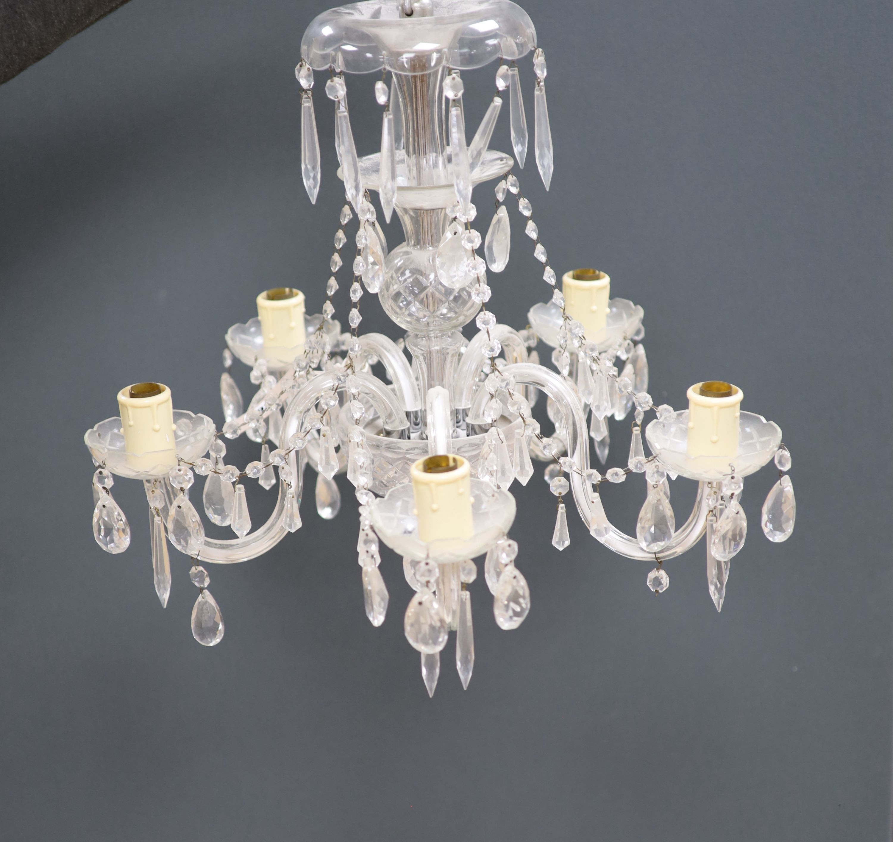 A five light glass chandelier, 51cm high